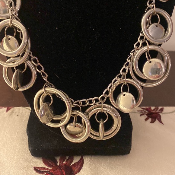 Charming Charlie - Lightweight silver color necklace w/ 12 sets of layered hoops - Picture 2 of 3